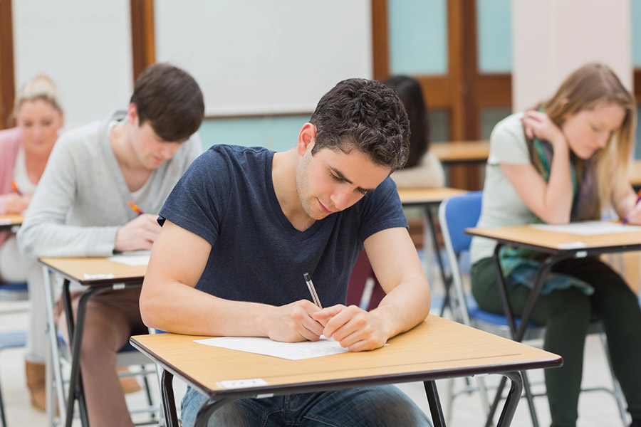 Students taking a test in a classroom in St Louis